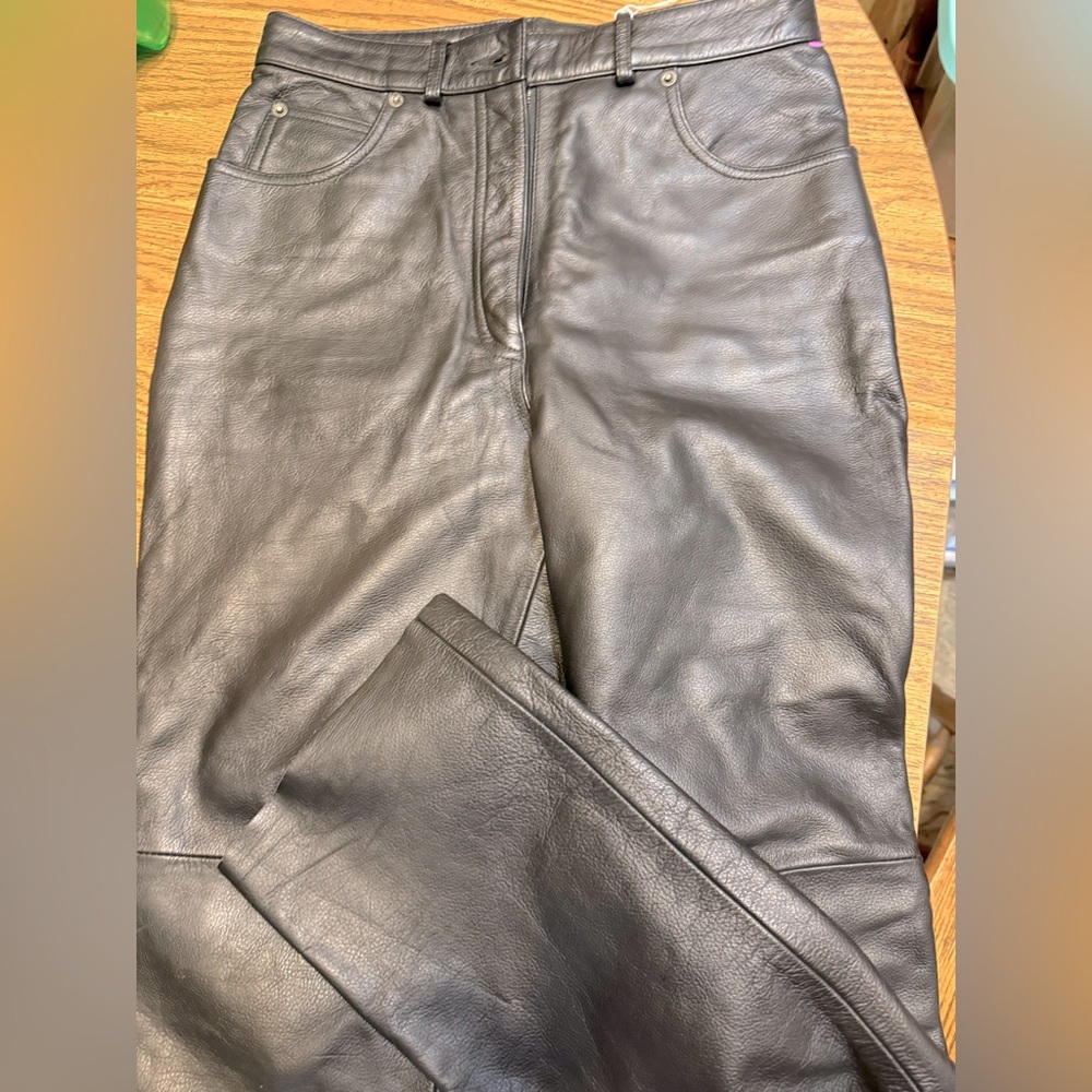 Leather pants size 10 lined with satin material, new never cut never altered